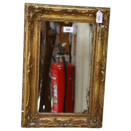 635 - A Victorian gilt-gesso framed wall mirror of small size, overall 50cm x 34cm