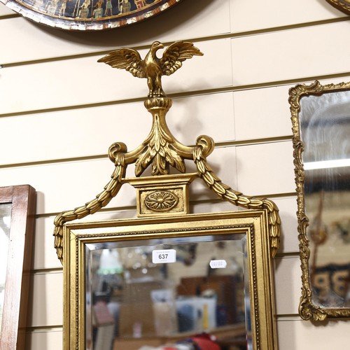 637 - Antique style gilt-framed bevel-edge wall mirror, surmounted by an eagle, 203cm