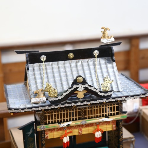 639 - A Japanese Hina house/temple, with painted and gilded lacquered decoration, boxed, H57cm