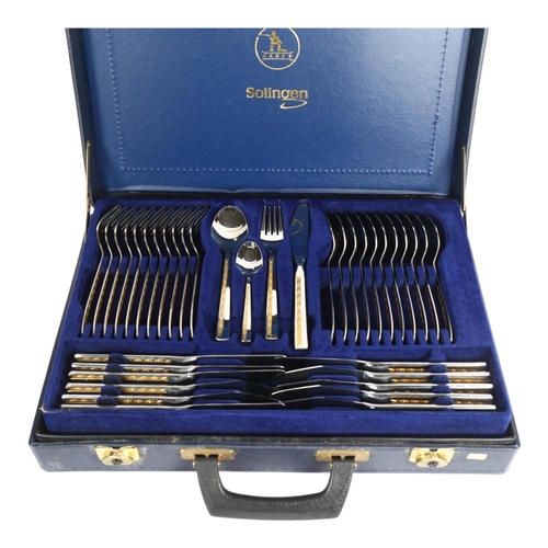 901 - A Jager Solingen 24ct gold plated and stainless steel canteen of cutlery for 12 people, in fitted ca... 