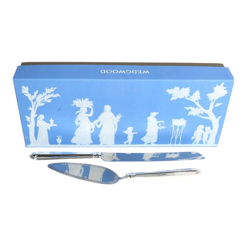 905 - A new and boxed Wedgwood stainless steel cake slice and knife