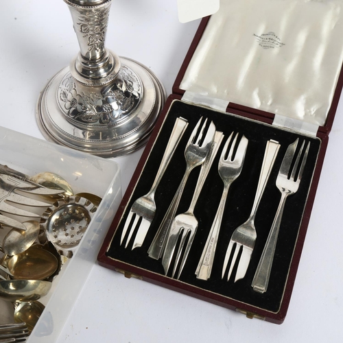 911 - An Elkington & Company silver plate on copper candelabra, various cutlery and candle snuffers