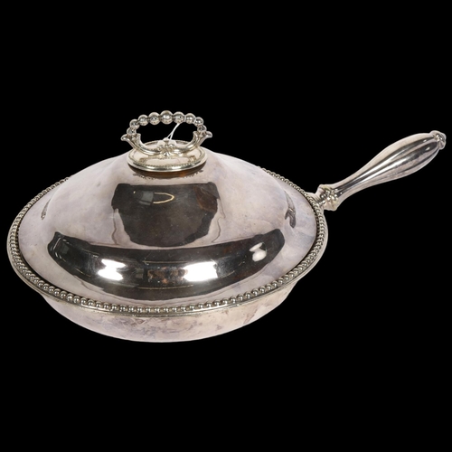 953 - A large circular electroplate vegetable serving pan and cover, by Waterhouse of Dublin, 28cm across