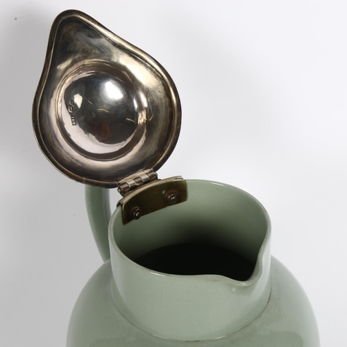 956 - A ceramic water flagon with Victorian silver lid, hallmarks for John Edward Terry, height to lid 20c... 