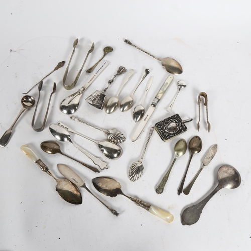 1000 - A group of various silver teaspoons, caddy spoons, silver-bladed knife, and various plated spoons