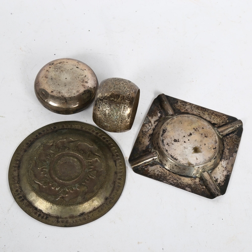 1007 - A group of white metal items, to include ashtray, napkin ring, small circular dish etc