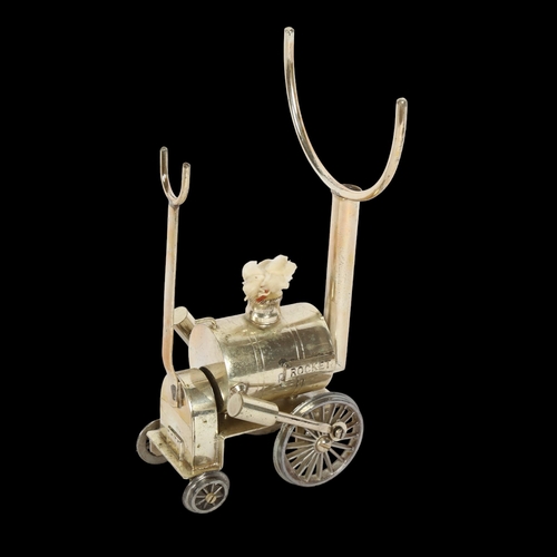 1012 - A silver plated Brandy warmer, in the form of Stephenson's Rocket, height 19.5cm, length 10cm