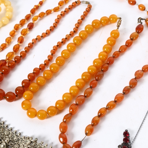 988 - A carnelian bead necklace, various bead and other necklaces