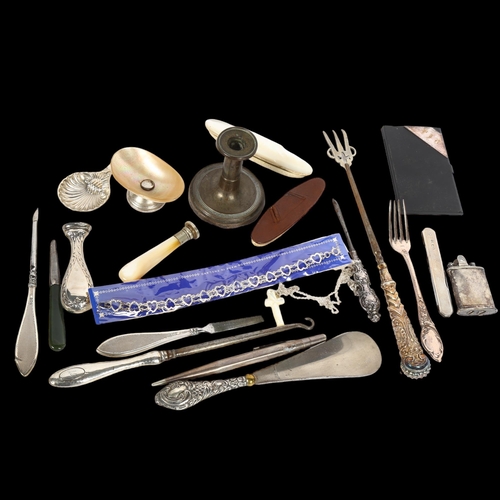 997 - A group of silver items, to include silver-handled button hooks, shoe horn, silver-footed mother-of-... 