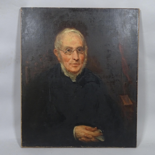 2846 - A Victorian oil on canvas of a learned gentleman with clasped hands, gallery tag on the reverse, the... 