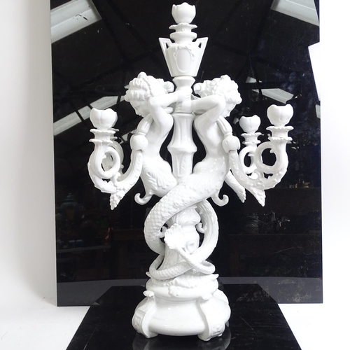 344 - An ornate 5-branch ceramic candelabrum, with mermaid figure supports, H62cm