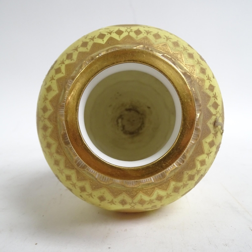 555 - Antique Minton's porcelain vase and cover, with gilded decoration on yellow ground, H28cm