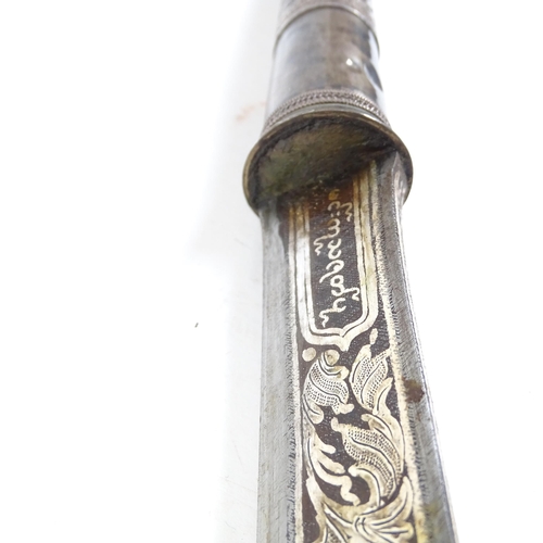 728 - A Middle Eastern sword with engraved decoration, L84cm, with brass scabbard, Oriental bamboo walking... 