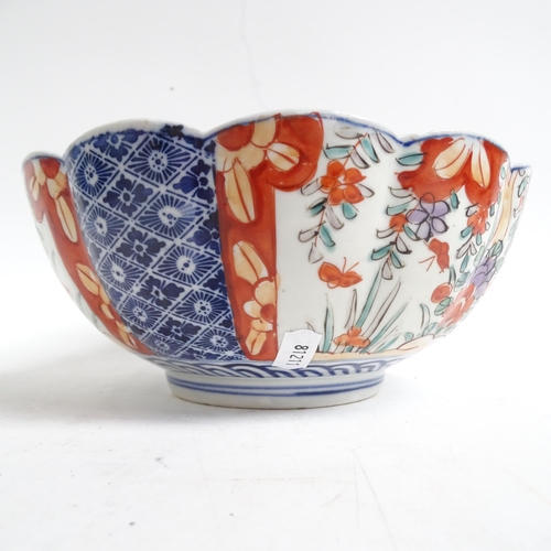 734 - A Chinese blue and white jardiniere, H17.5cm, Imari bowl, ginger jar, and a pot decorated with butte... 