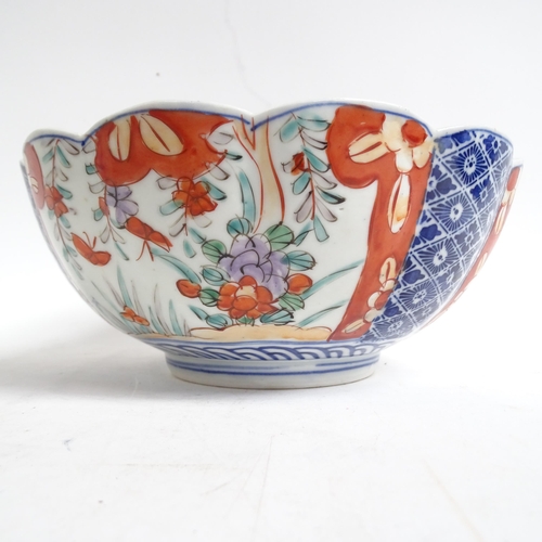 734 - A Chinese blue and white jardiniere, H17.5cm, Imari bowl, ginger jar, and a pot decorated with butte... 