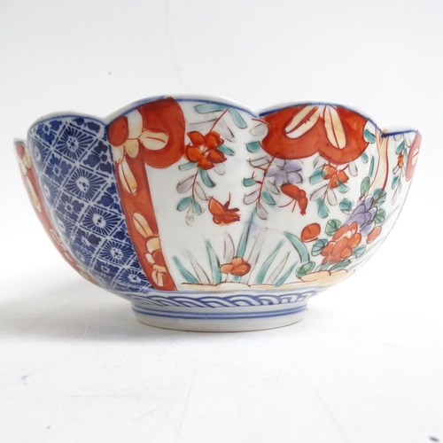 734 - A Chinese blue and white jardiniere, H17.5cm, Imari bowl, ginger jar, and a pot decorated with butte... 