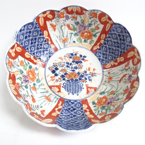 734 - A Chinese blue and white jardiniere, H17.5cm, Imari bowl, ginger jar, and a pot decorated with butte... 