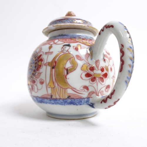 565 - A Chinese porcelain teapot with painted and gilded figure and building design, H11cm, and an Imari p... 