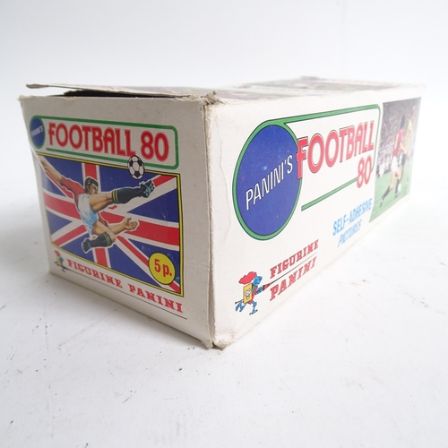 662 - PANINI - a Football 80 Panini counter display box, a used but sealed football 81 sticker packet, an ... 