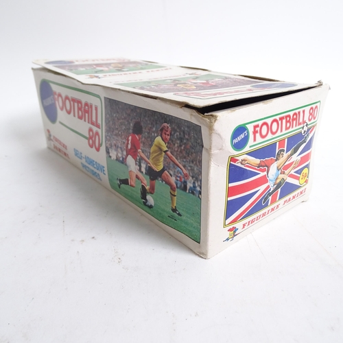 662 - PANINI - a Football 80 Panini counter display box, a used but sealed football 81 sticker packet, an ... 