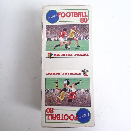 662 - PANINI - a Football 80 Panini counter display box, a used but sealed football 81 sticker packet, an ... 