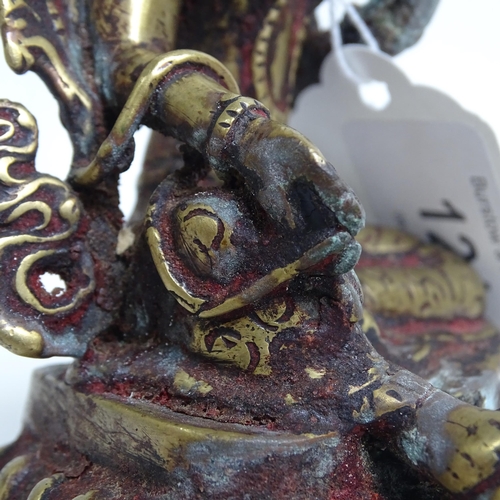 121 - A Tibetan bronze Buddhist figure 