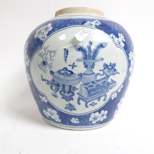 334 - A Chinese blue and white ginger jar and cover, with panels of interior designs on prunus ground, H22... 