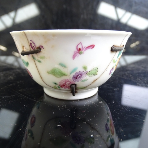 564 - A pair of Chinese famille rose tea bowls and matching saucer, and another Chinese porcelain tea bowl... 