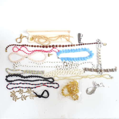 914 - A large collection of costume jewellery, coral necklaces, jade bangles, wristwatches etc