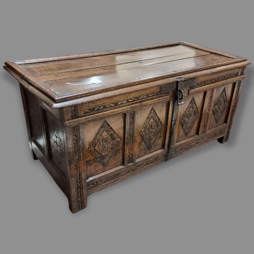 289 - An Italian 18th century walnut Cassonne, carved detail to front and sides, 128 x 60cm, height 58cm