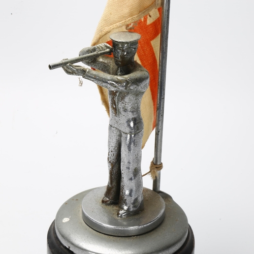 10 - Naval Interest - an early 20th century chromed metal sailor and Royal Ensign flag, on wood plinth, o... 