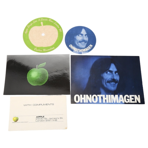 13 - Beatles Interest - a collection of 1970s' Apple memorabilia, including postcard, turntable centre, c... 