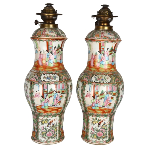 20 - A pair of large Chinese Canton famille rose ceramic baluster oil lamps, with hand painted and enamel... 