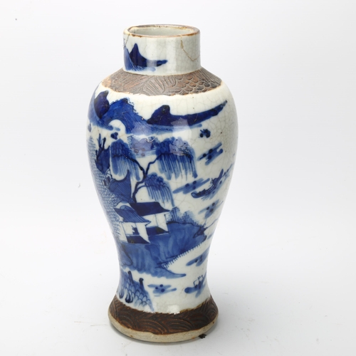 29 - A Chinese blue and white crackle glaze baluster vase, with hand painted village and mountain scene, ... 