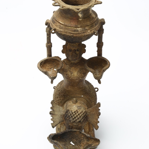 3 - An early 19th century Basar tribal oil lamp depicting Lakshmi, Goddess of Light on a elephant carryi... 