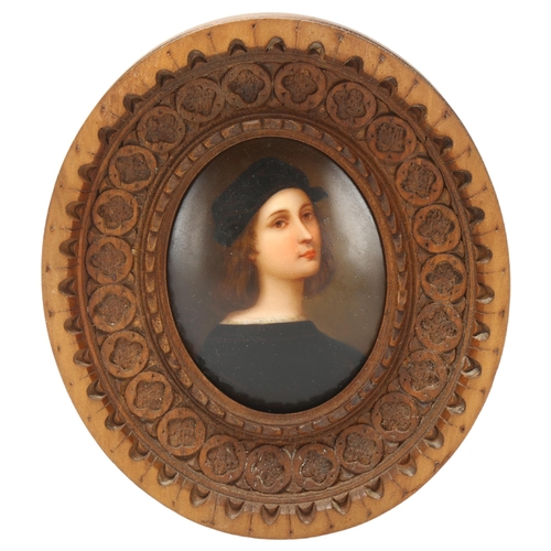 6 - A 20th century miniature portrait on porcelain plaque, after Raphael's self-portrait, in carved wood... 