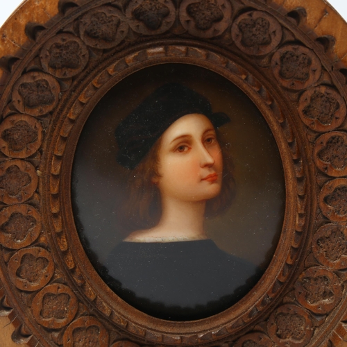 6 - A 20th century miniature portrait on porcelain plaque, after Raphael's self-portrait, in carved wood... 