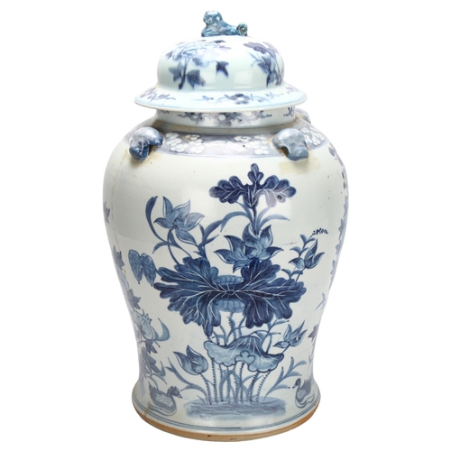 105 - A large Chinese blue and white porcelain jar with floral decoration, height 44cm