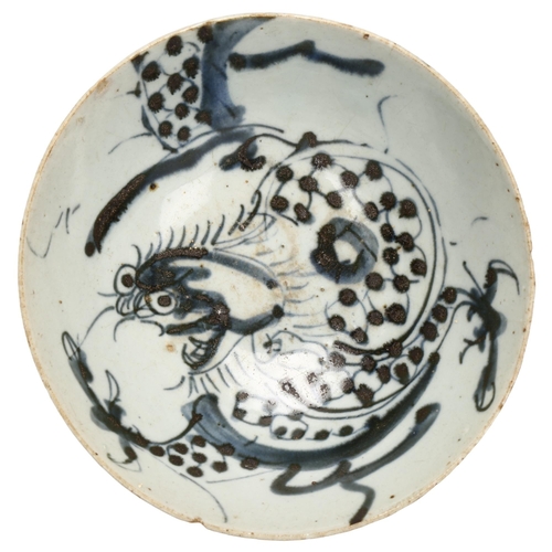 108 - A Chinese blue and white pottery 'Dragon' footed bowl, diameter 16cm