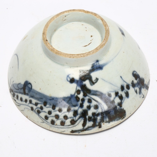 108 - A Chinese blue and white pottery 'Dragon' footed bowl, diameter 16cm