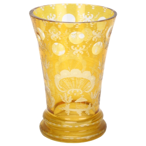 122 - A 19th century Bohemian amber-flashed glass spa beaker, with etched stag and bridge decoration, heig... 