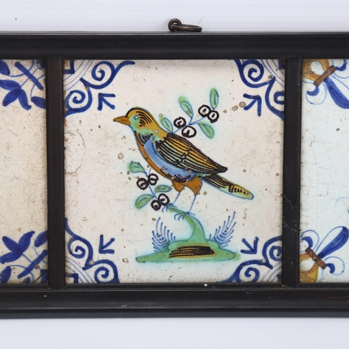 126 - A set of 3 x 18th/19th century Delft bird tiles, in common ebony frame, overall 40 x 15cm