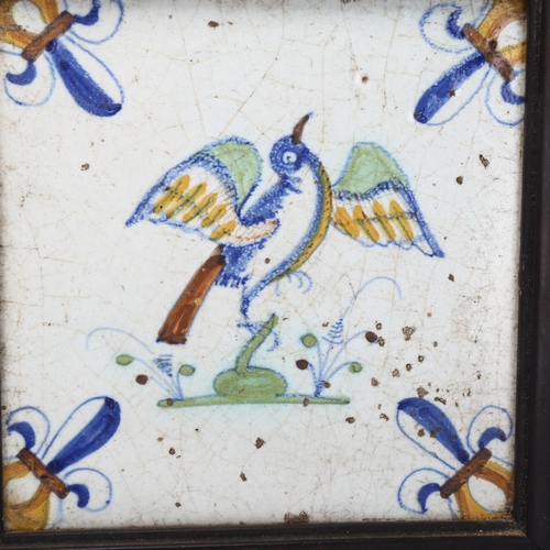 126 - A set of 3 x 18th/19th century Delft bird tiles, in common ebony frame, overall 40 x 15cm