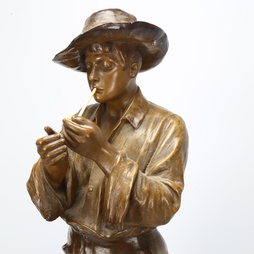 130 - A large Art Nouveau Austrian Goldscheider terracotta statue of gaucho smoking pipe, signed to base, ... 