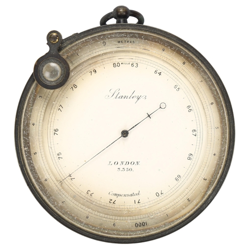 37 - A Stanley of London brass aneroid barometer, late 19th century, with swivel magnifying glass, dial n... 