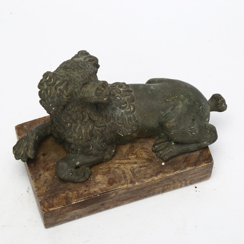 47 - A patinated bronze figural Spaniel dog sculpture, on simulated marble base, base length 12cm