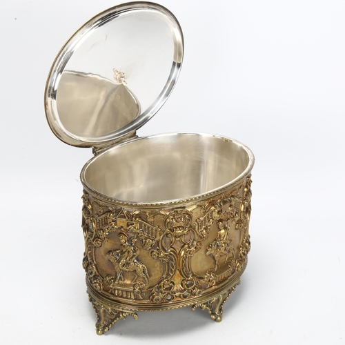 55 - A large 19th century electroplated brass Classical biscuit tin, with relief embossed putti and folia... 