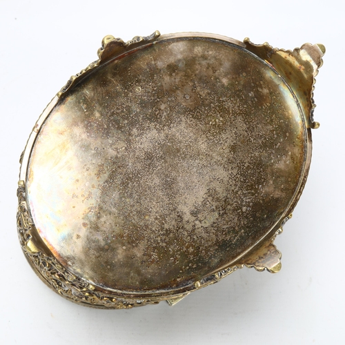 55 - A large 19th century electroplated brass Classical biscuit tin, with relief embossed putti and folia... 