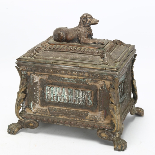 56 - An early 20th century electroplated Regalia cigarres tobacco/cigar casket, with dog knop and lion pa... 