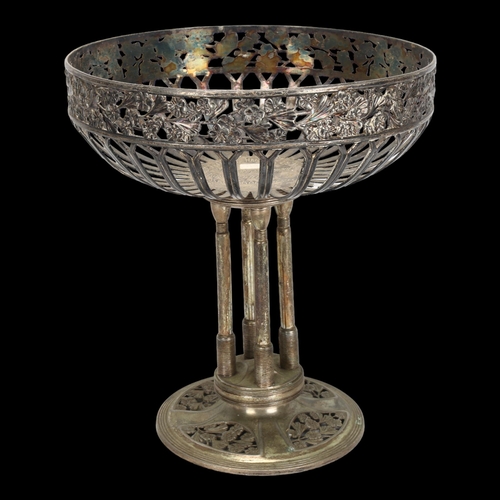 59 - A large German Art Nouveau silver plated tazza centre piece, with pierced and relief cast floral bor... 